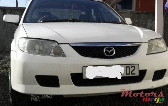 2002' Mazda 323 photo #3