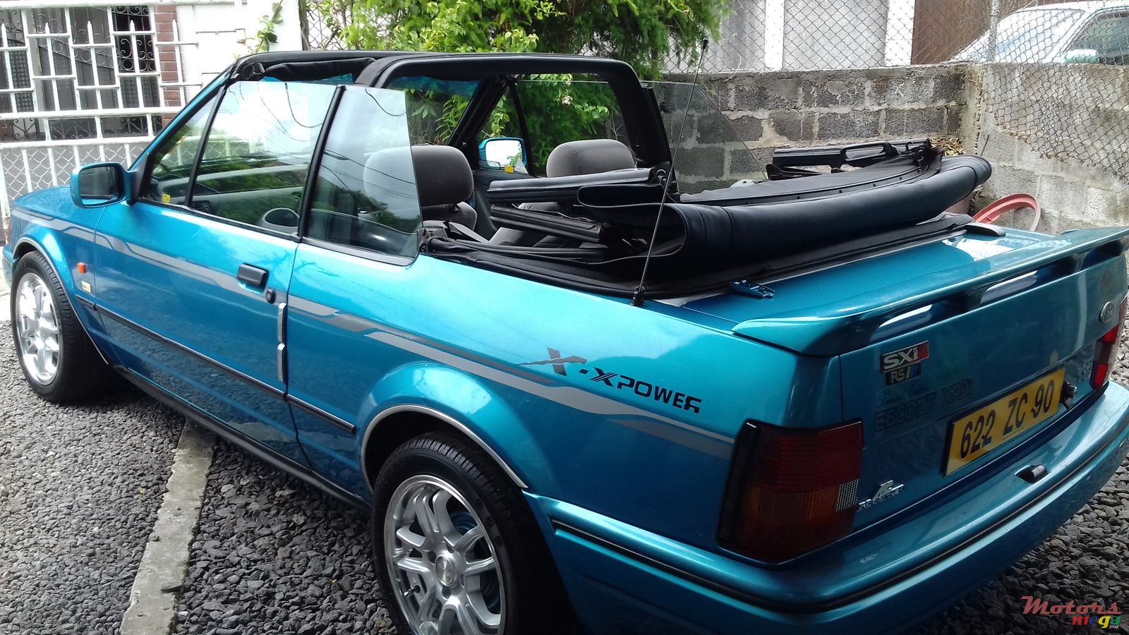 1990' Ford Escort convertible photo #1