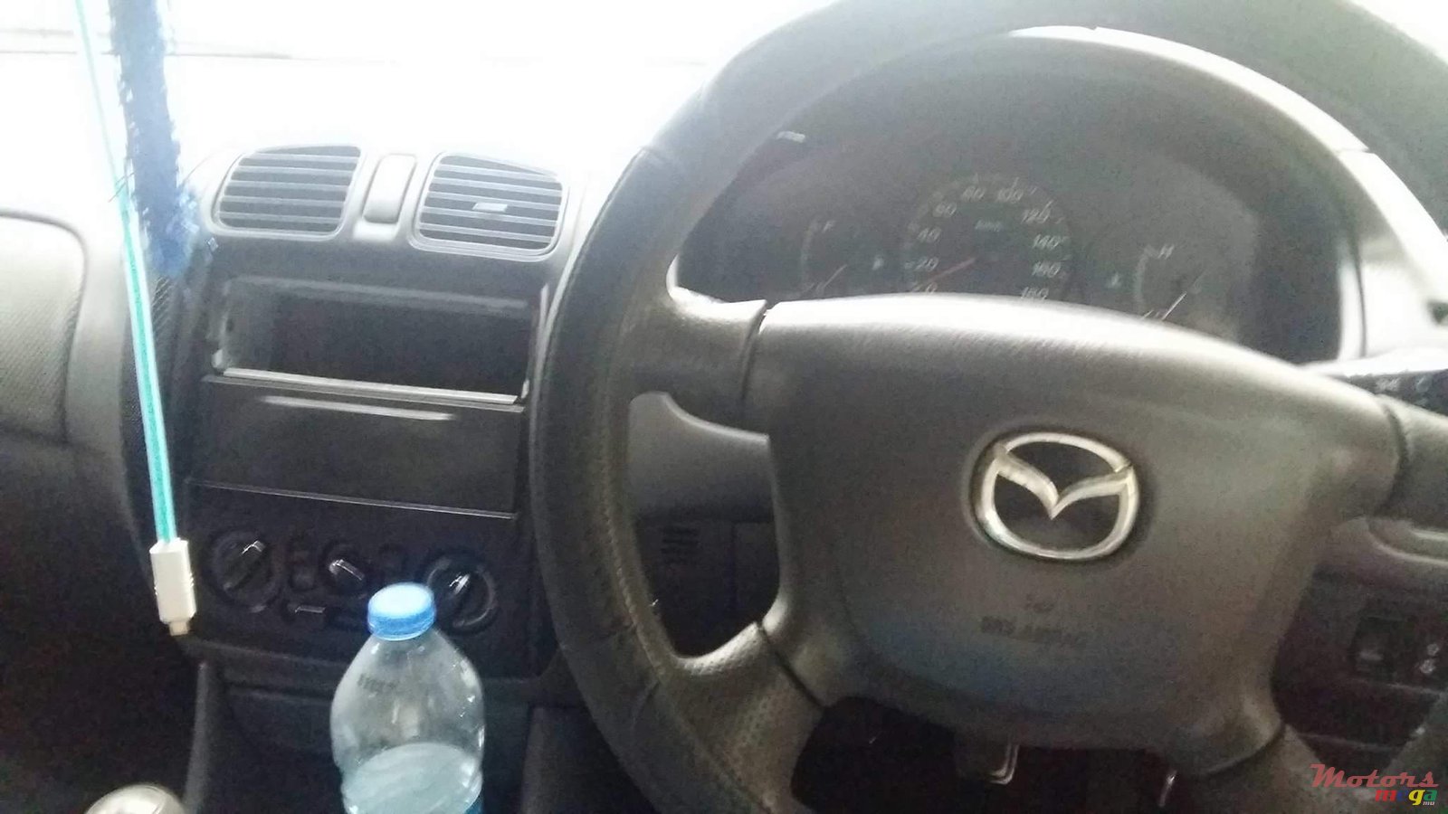 1999' Mazda 323 photo #5