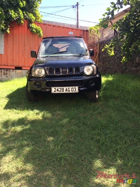 2003' Suzuki Jimny 1.3L photo #1