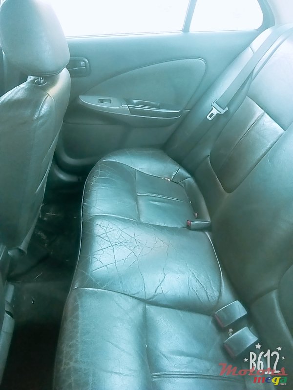 2004' Nissan Sunny photo #5