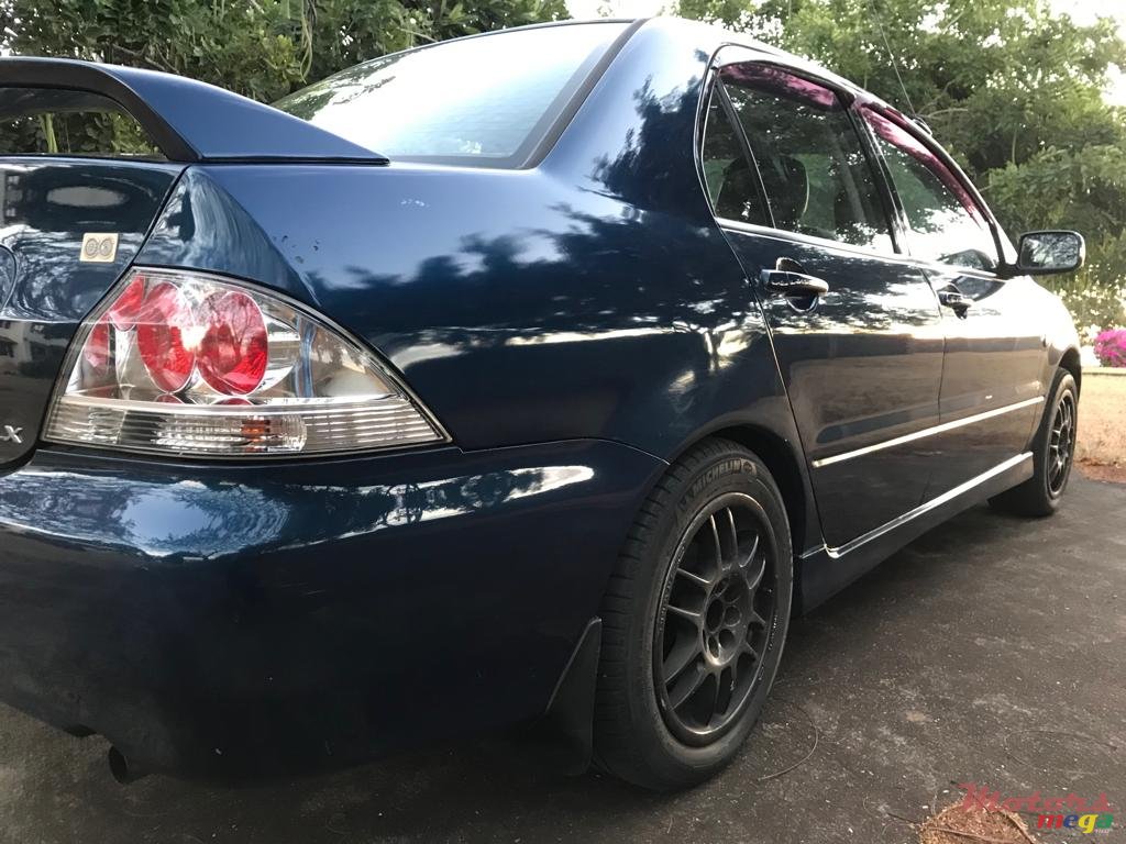2004' Mitsubishi Lancer photo #3
