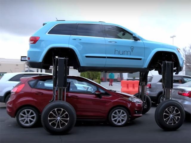 This Jeep Grand Cherokee Has A Hydraulic Lift That Defeats Traffic