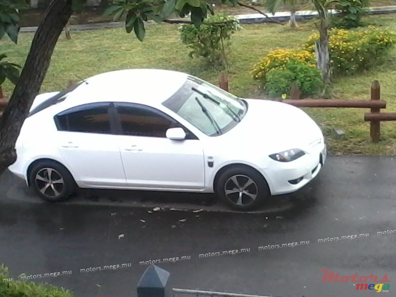 2004' Mazda 3 photo #1