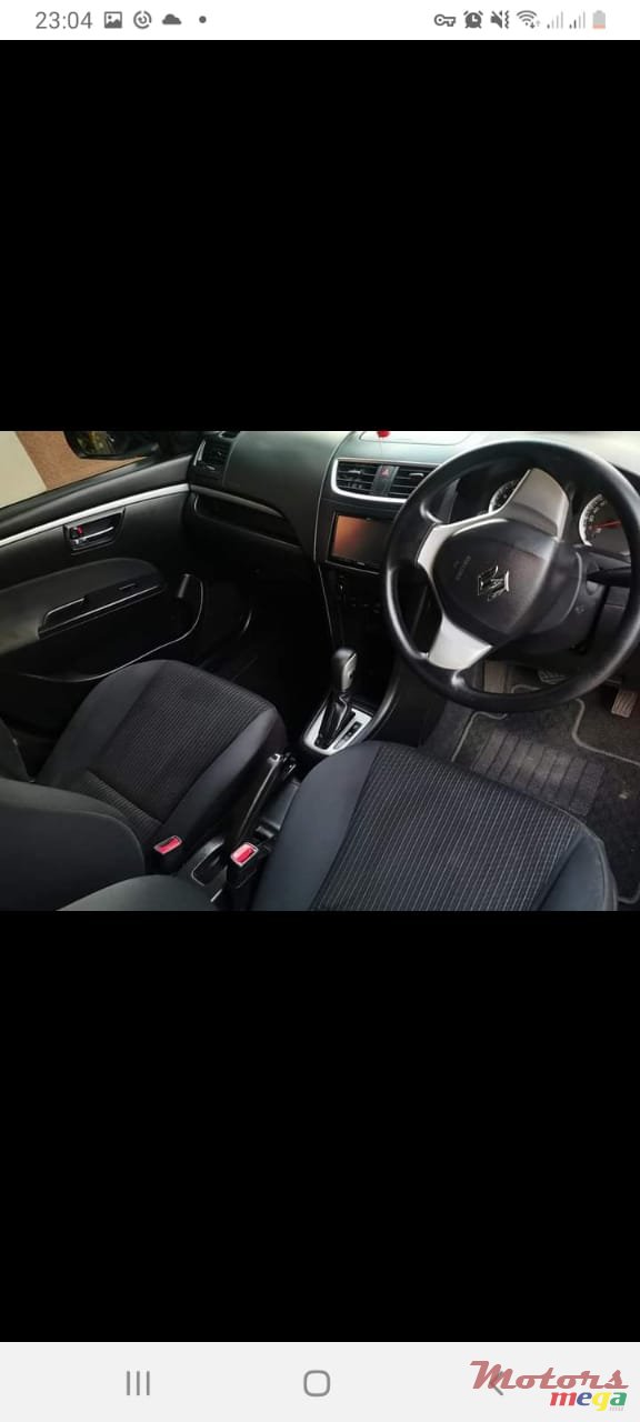 2004' Suzuki Swift photo #3