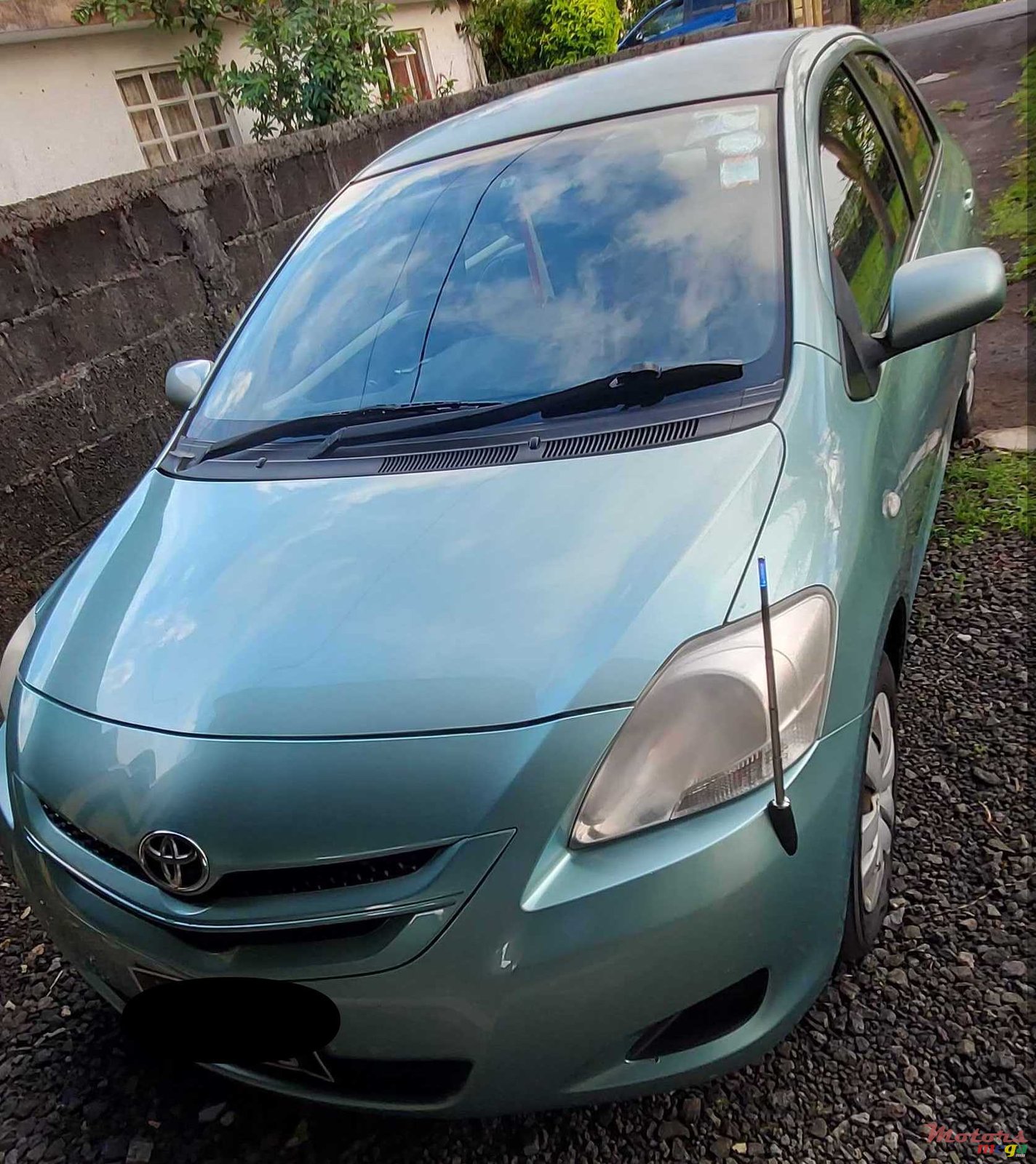 2006' Toyota Belta photo #1