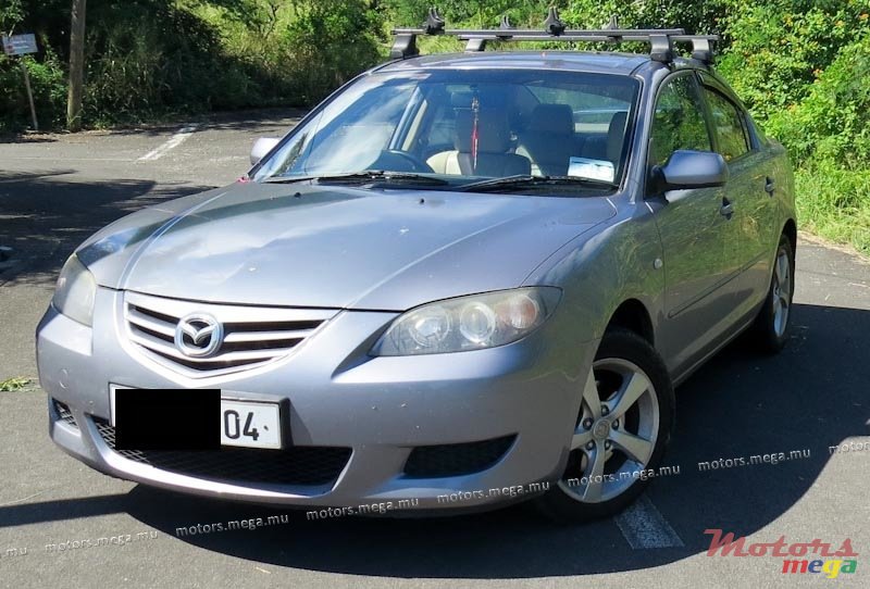 2004' Mazda 3 sedan photo #1