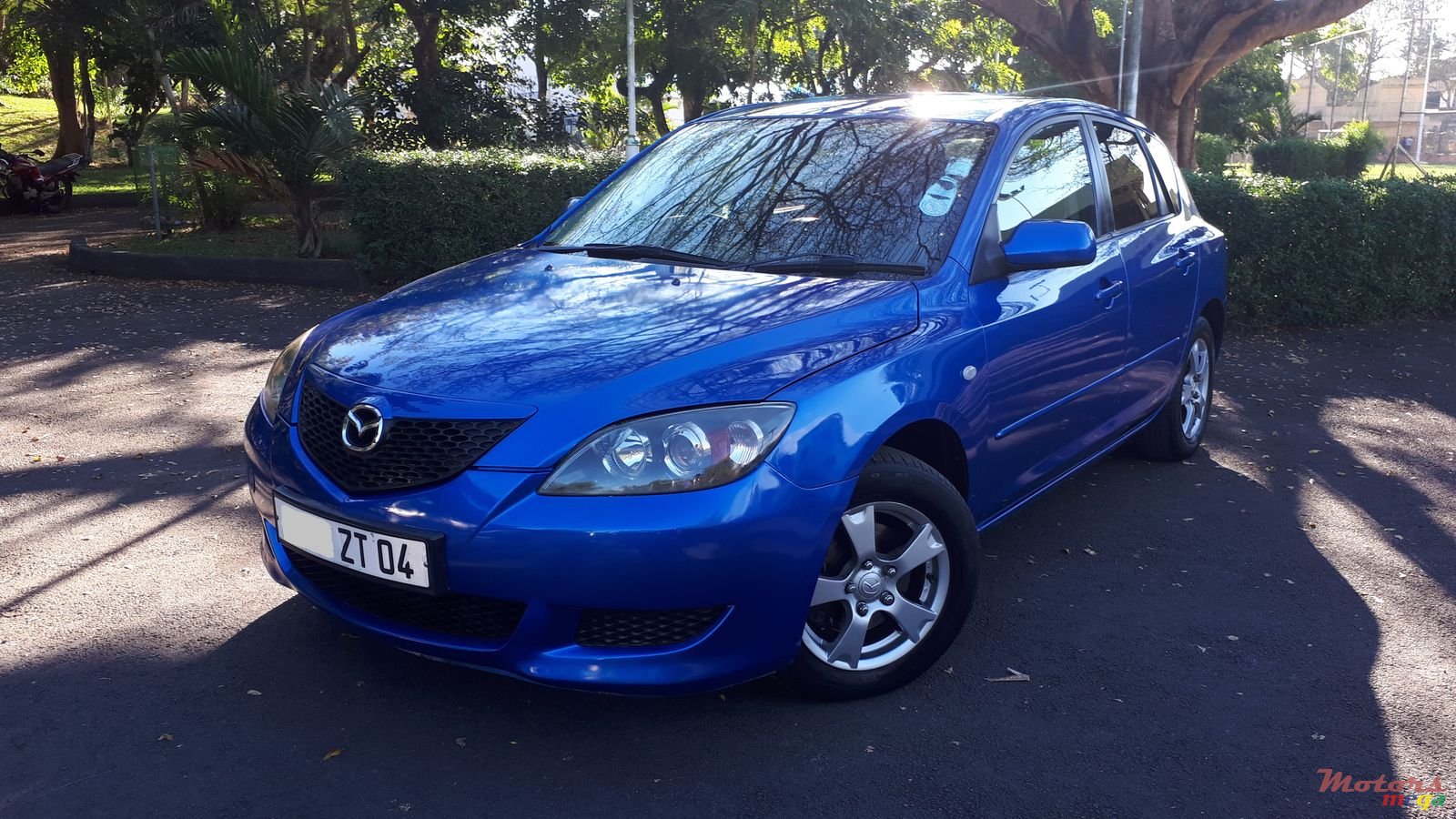 2004' Mazda 3 photo #1