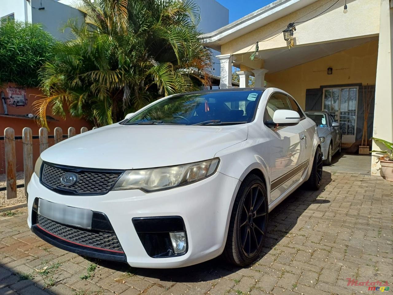 2012' Kia Cerato Koup photo #1
