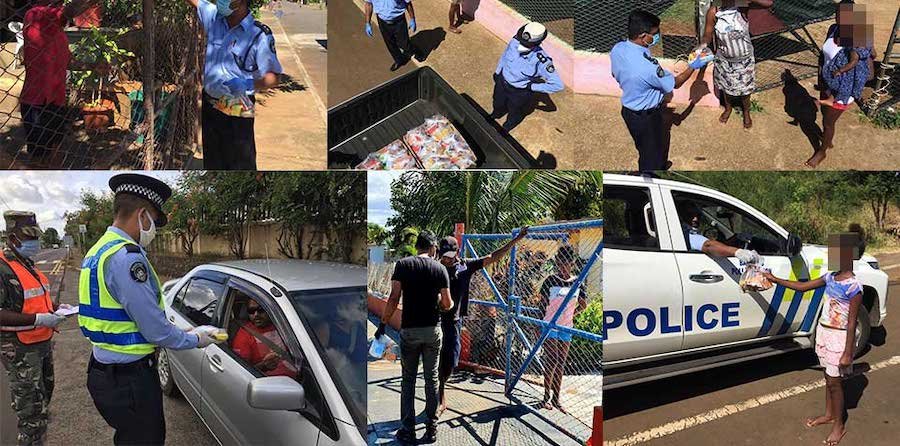 Bambous : des policiers distribuent des biscuits aux habitants et aux automobilistes