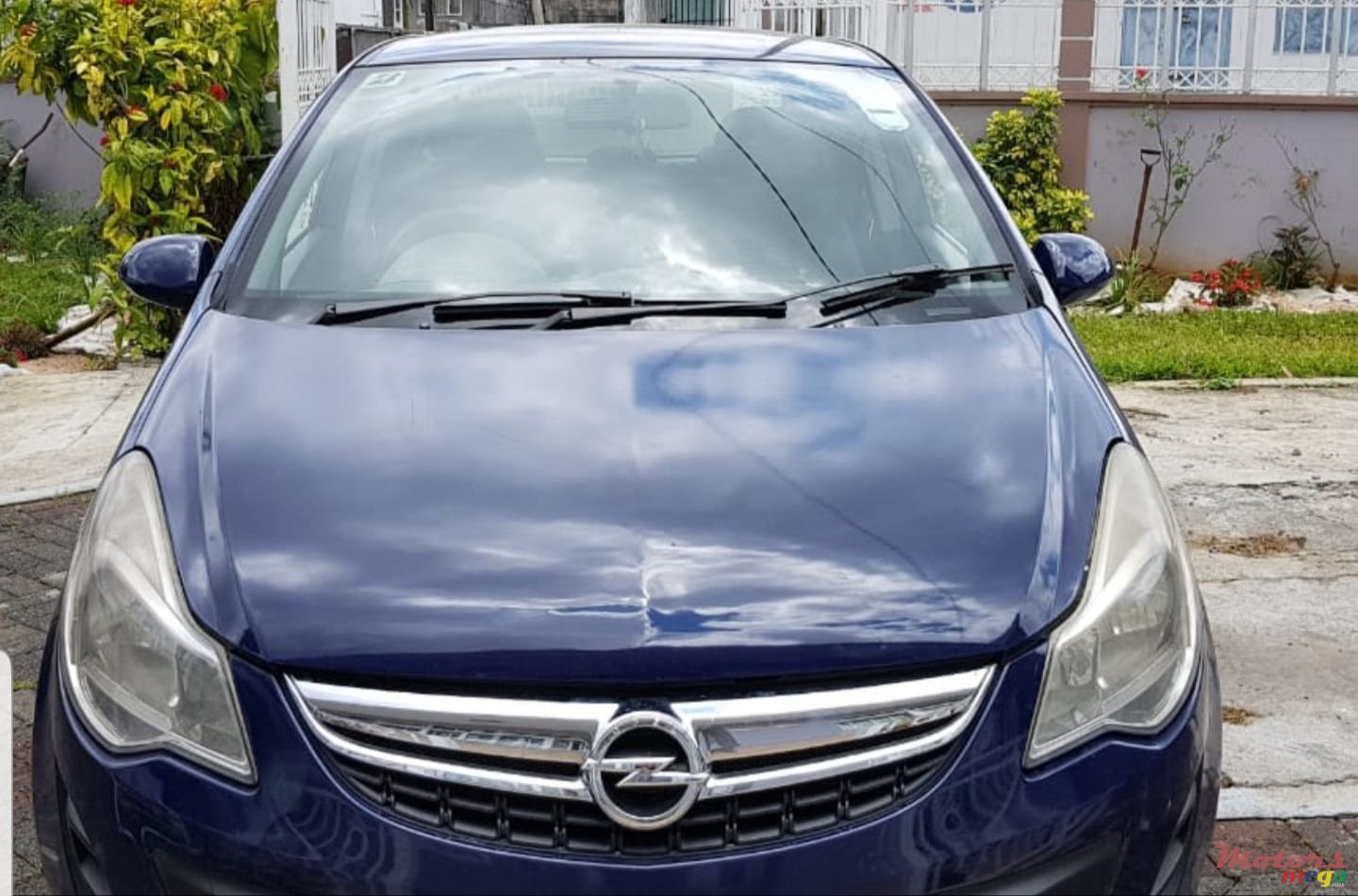 2012' Opel Corsa photo #1