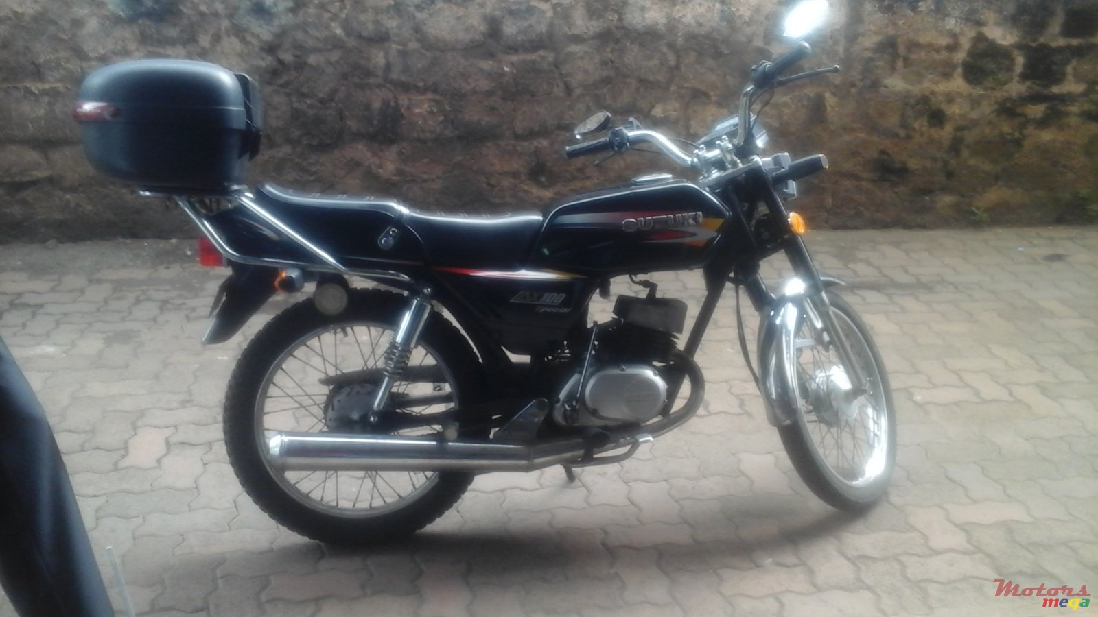 2009' Suzuki AX100 photo #1