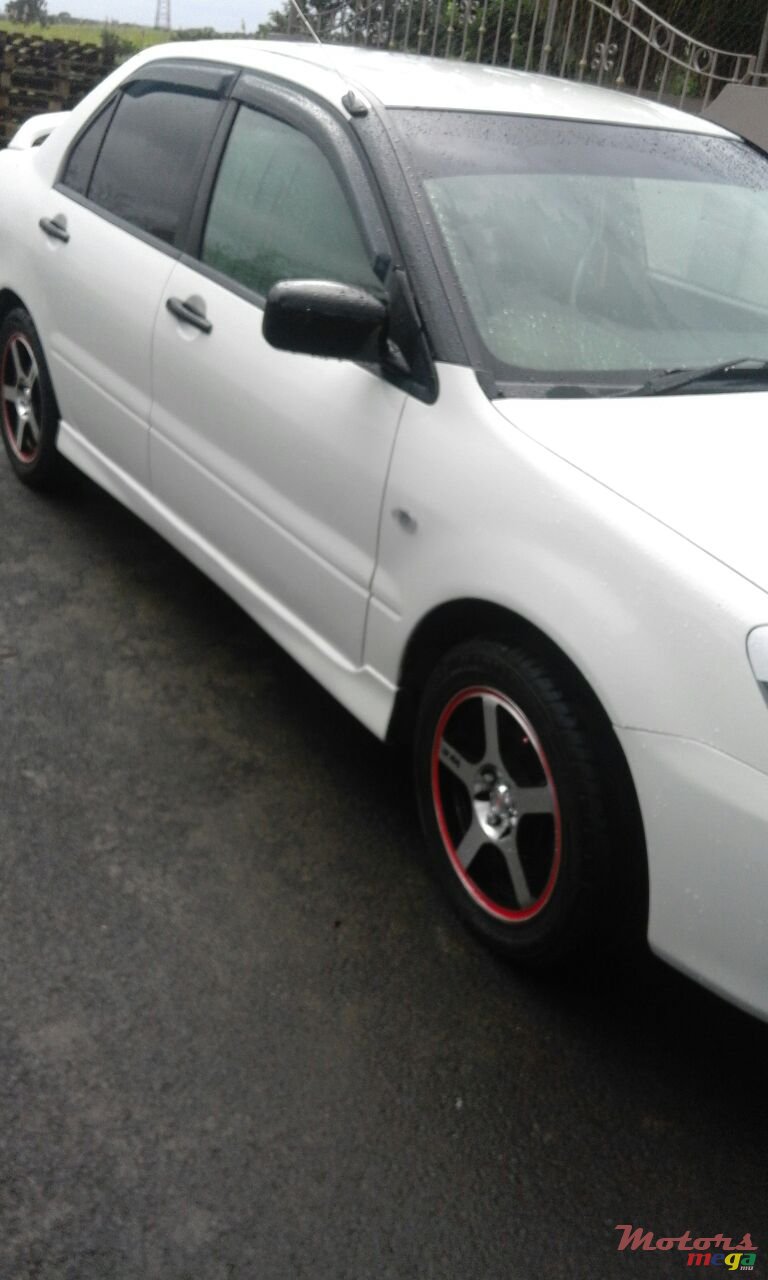 2006' Mitsubishi Lancer photo #1