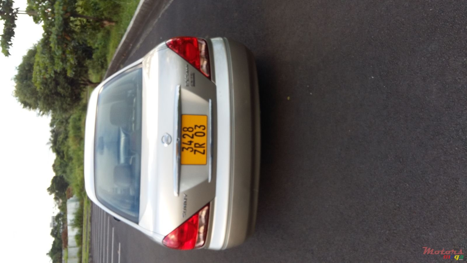 2003' Nissan Sunny photo #1