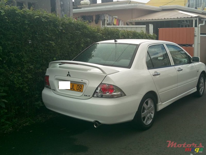 2009' Mitsubishi Lancer GLX photo #2