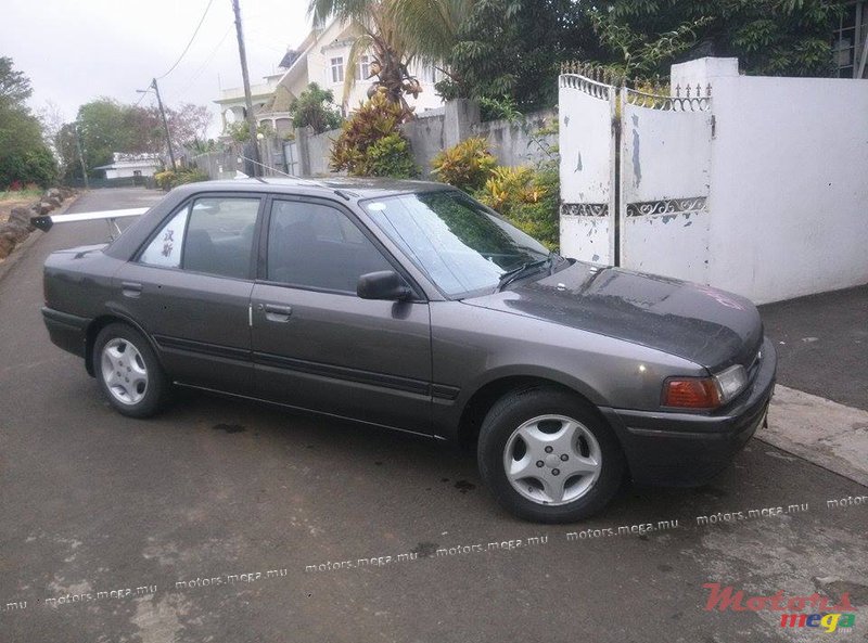 1994' Mazda 323 photo #1