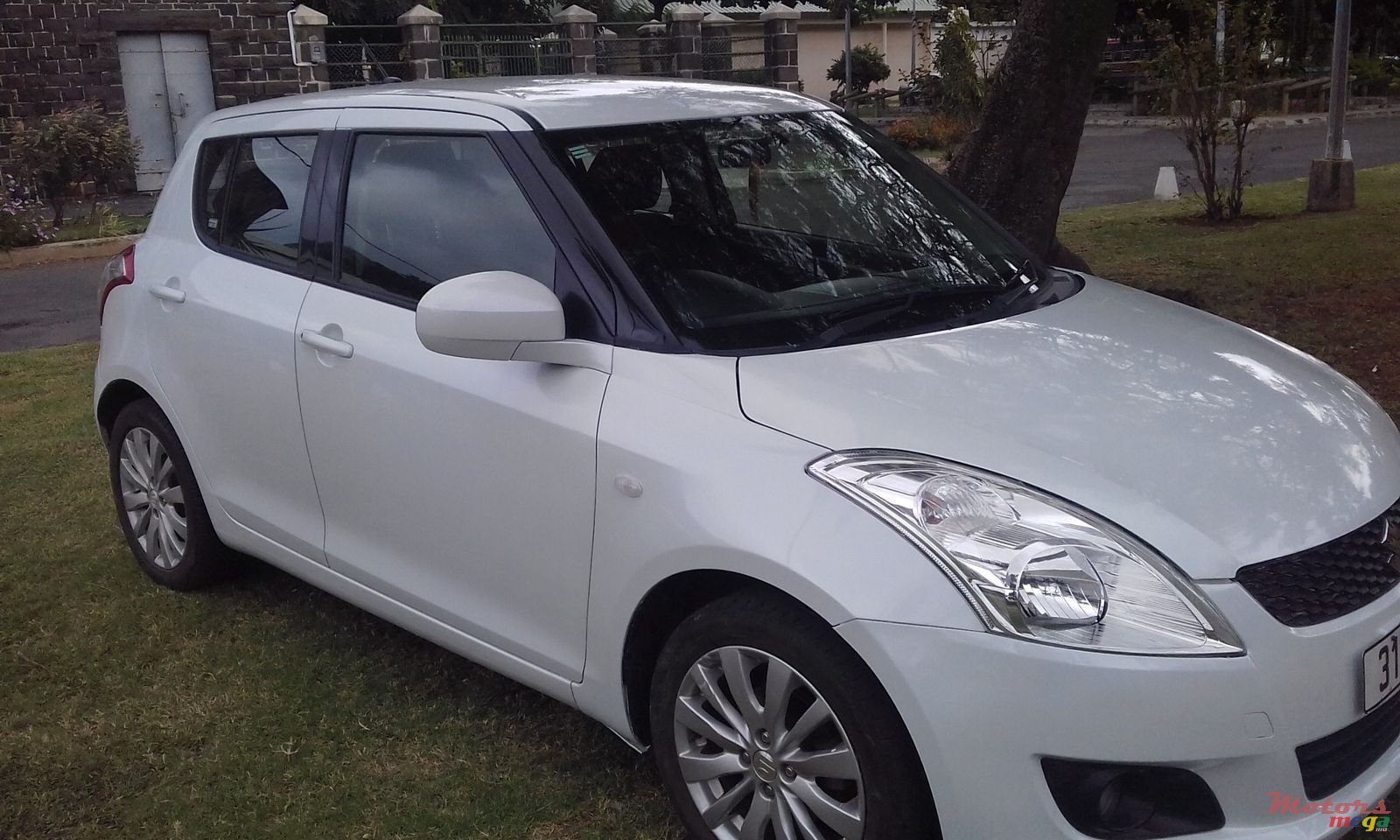 2013' Suzuki Swift photo #1