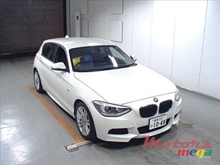 2014' BMW 116 i photo #1