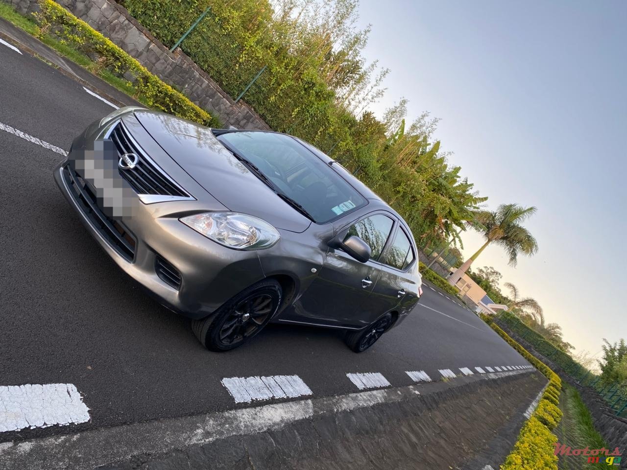 2012' Nissan Almera photo #2