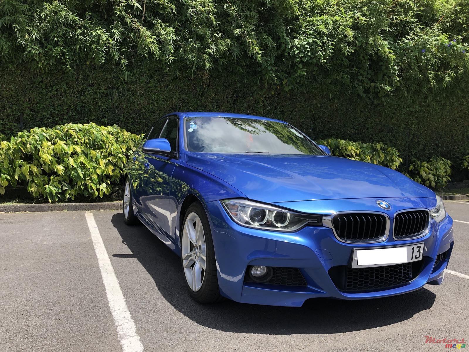 2013' BMW 3 Series M Sport photo #1