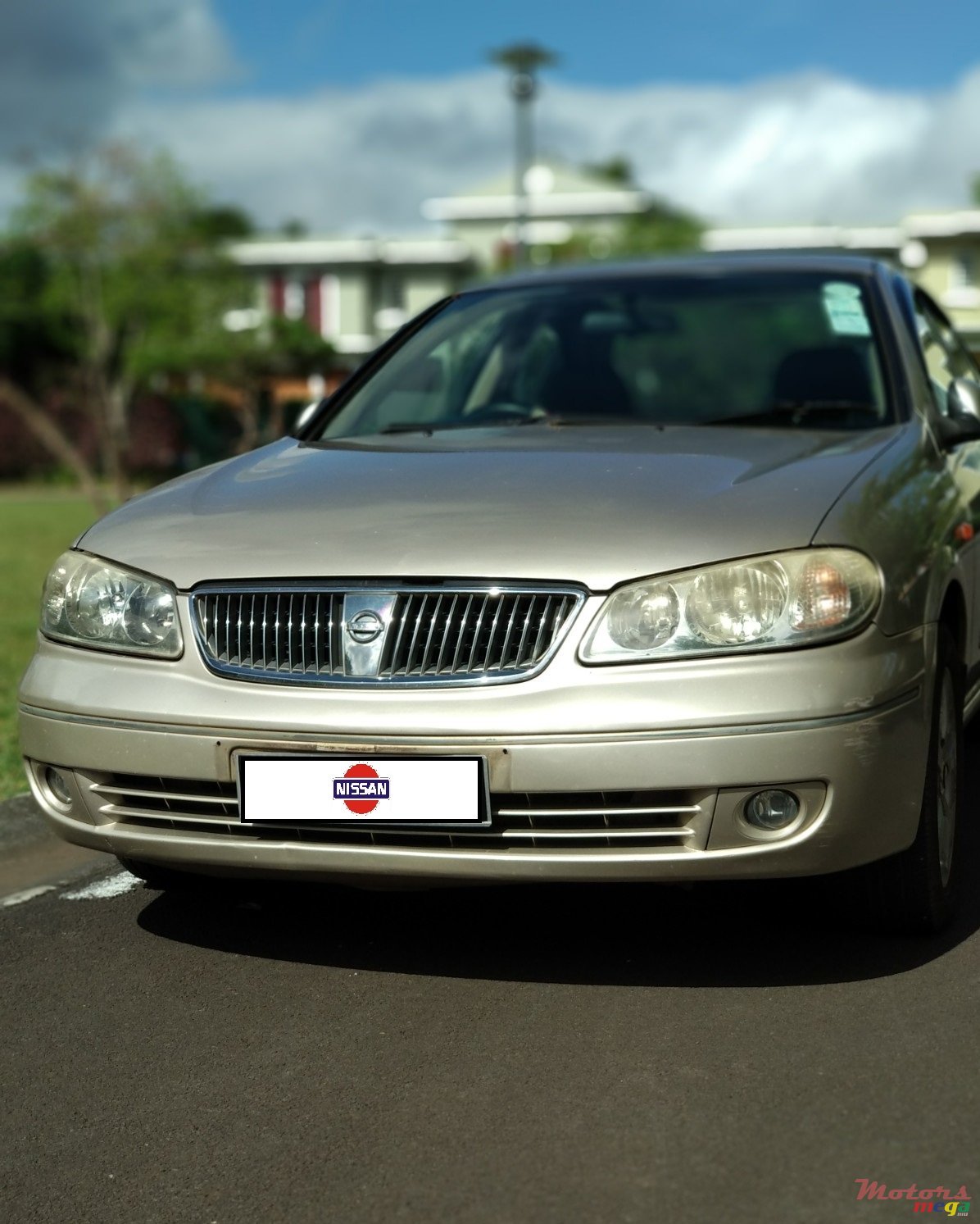 2004' Nissan Sunny photo #1