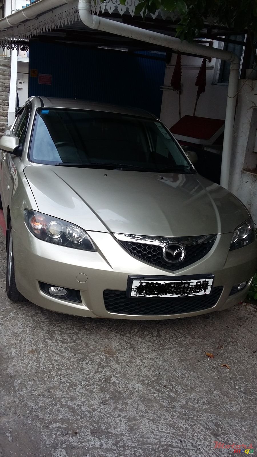 2007' Mazda 3 photo #1