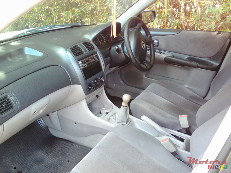 2002' Mazda 323 photo #3