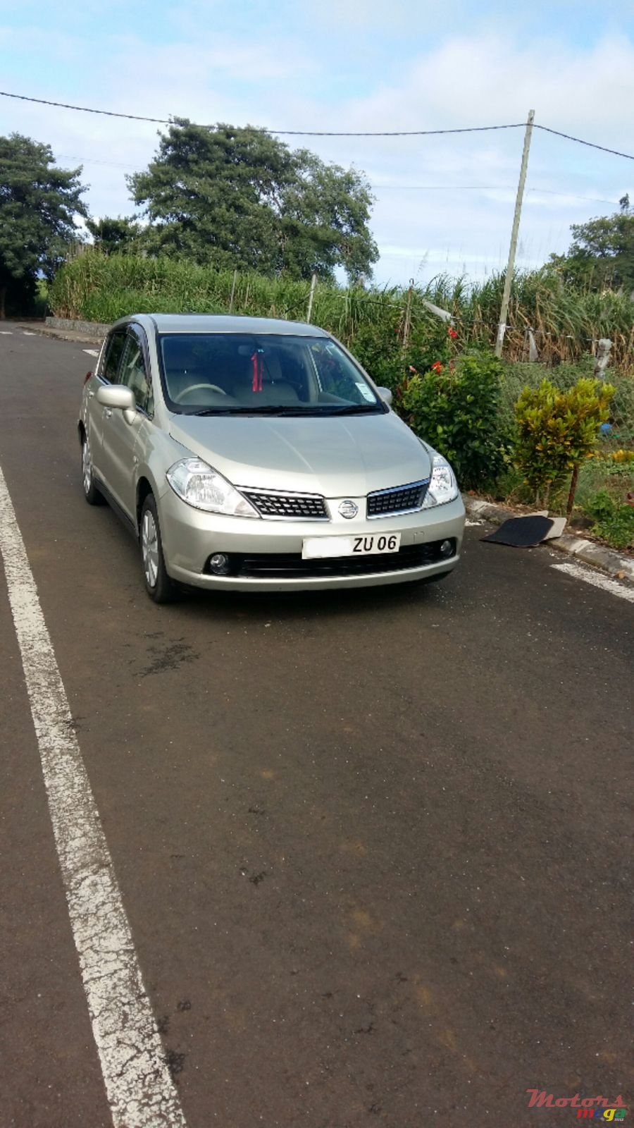2006' Nissan Tiida photo #1