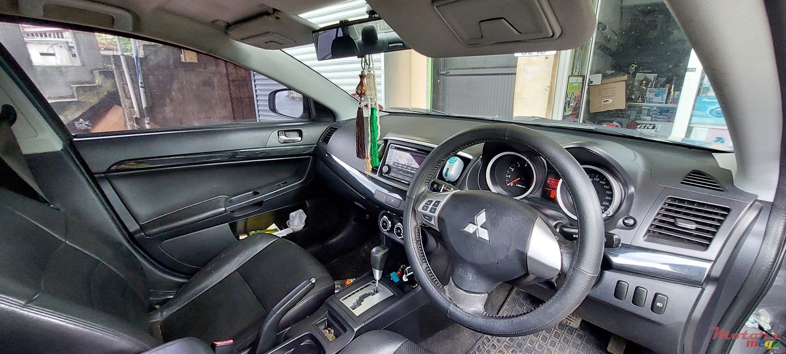 2016' Mitsubishi Lancer Ex photo #5