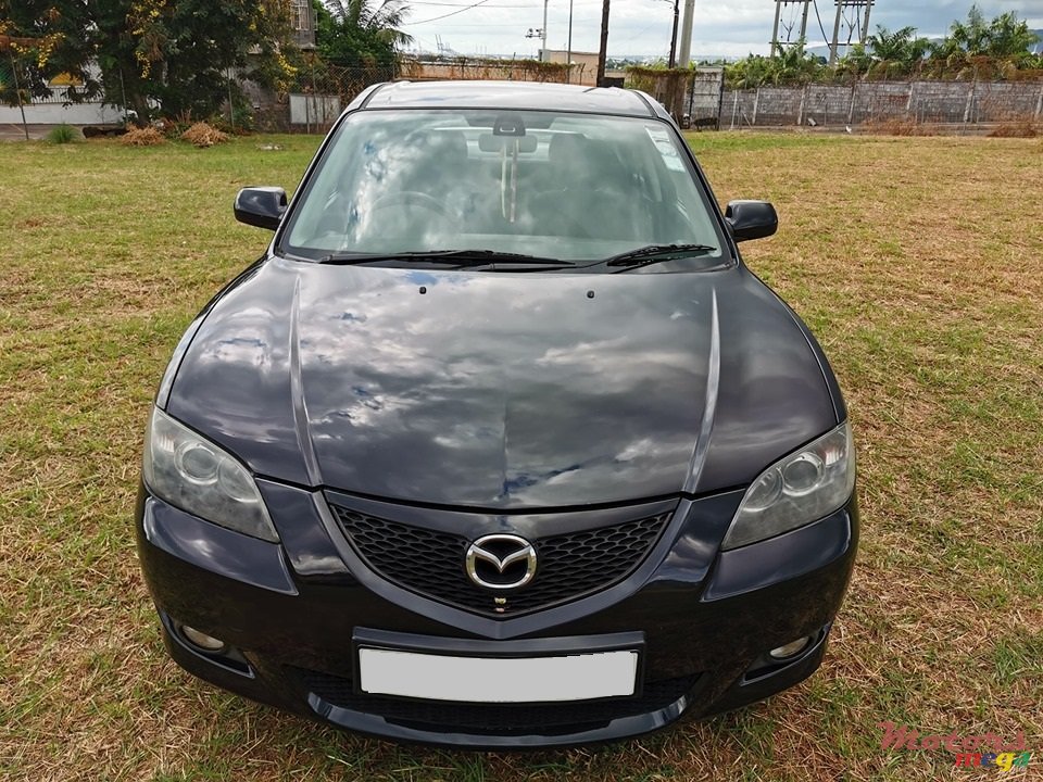 2006' Mazda 3 photo #1