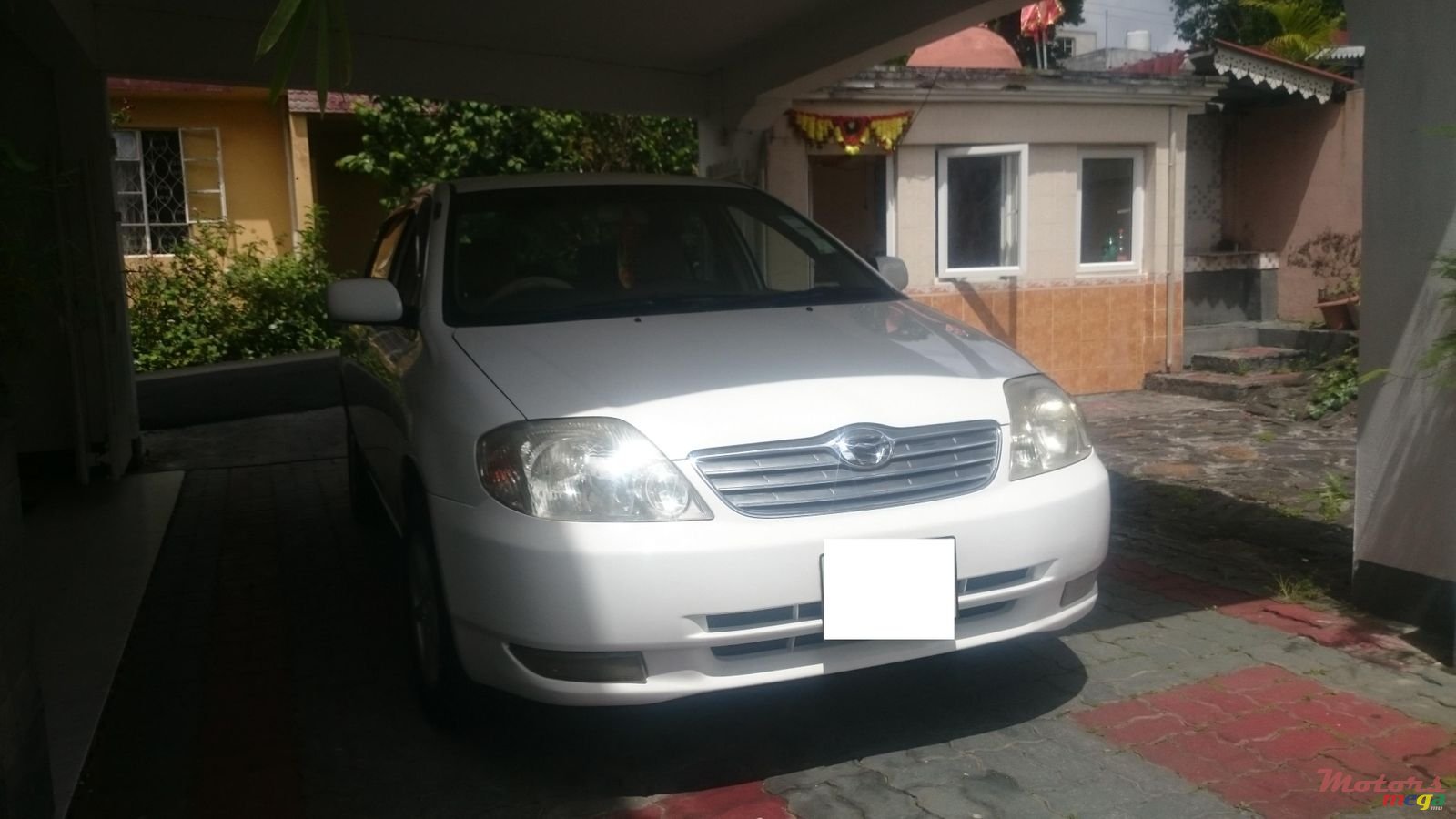 2003' Toyota Corolla NZE photo #1