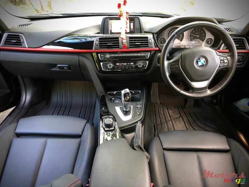 2015' BMW 318 318i photo #3