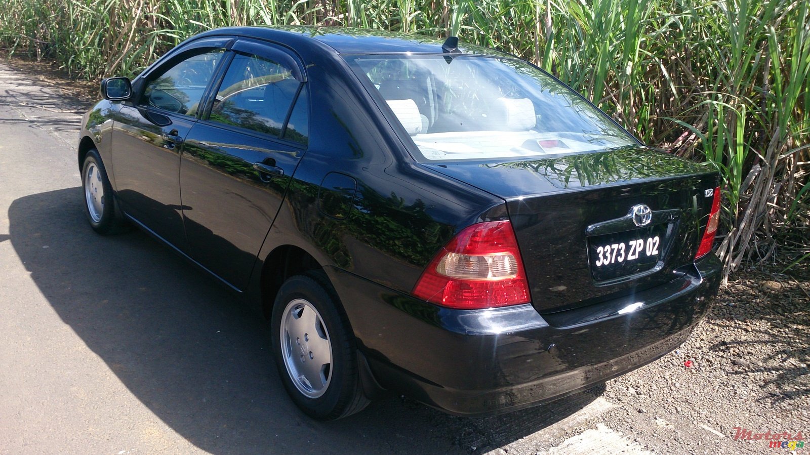 2002' Toyota Corolla nze grade X photo #1