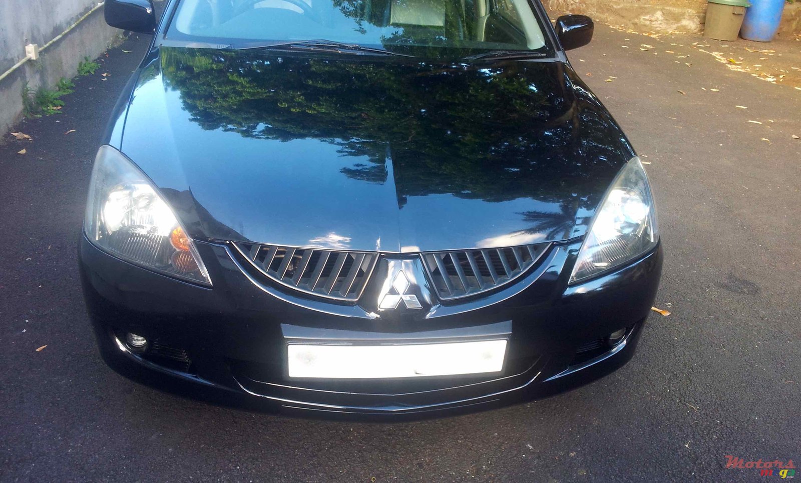 2004' Mitsubishi Lancer glx photo #1