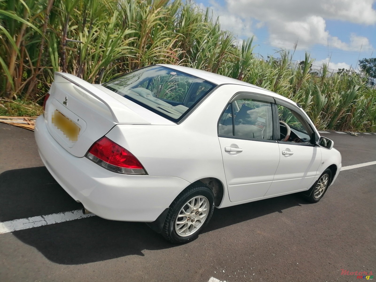 2004' Mitsubishi Lancer photo #5
