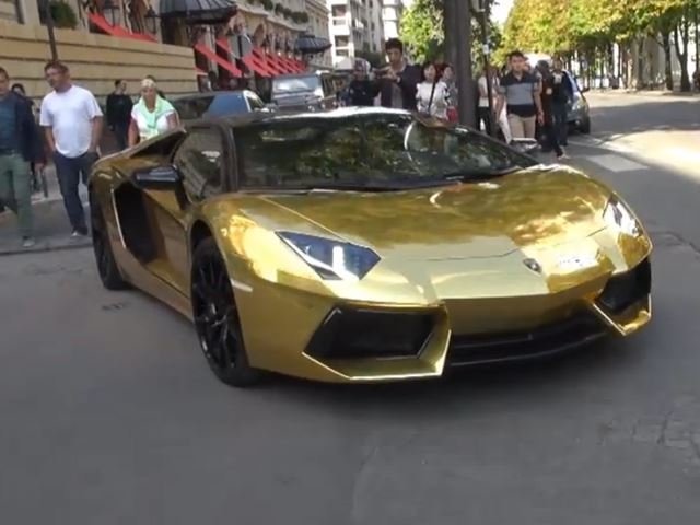 Gold Lamborghini Aventador Roadster Whispers Around Paris