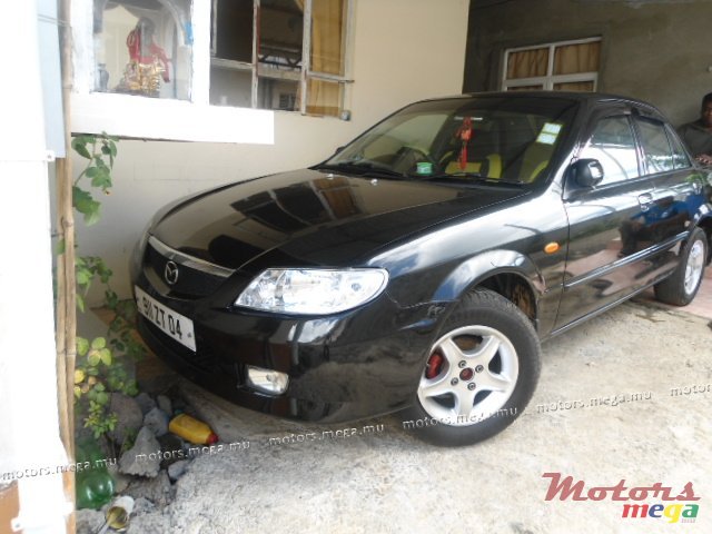 2004' Mazda 323 full option photo #1