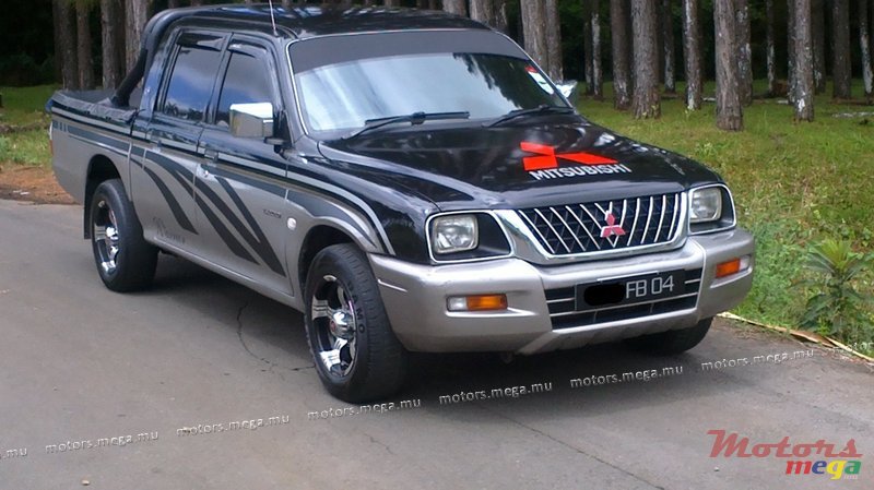 2004' Mitsubishi Warrior L200 photo #1