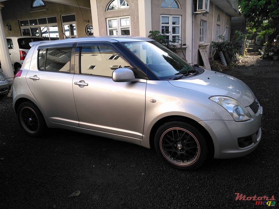 2009' Suzuki Swift photo #2