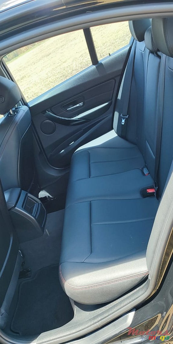 2014' BMW 316 photo #7