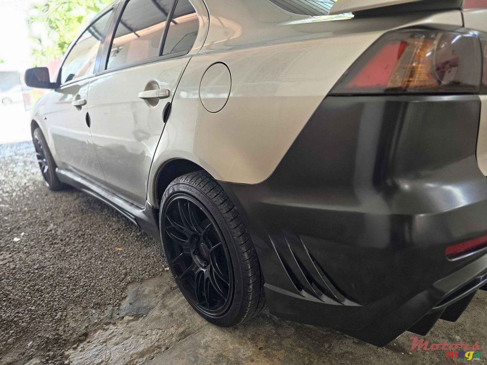 2013' Mitsubishi Lancer photo #3