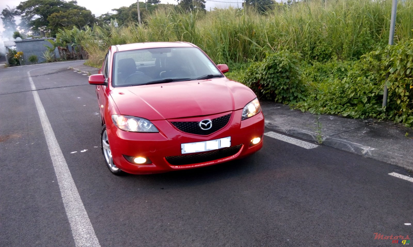 2005' Mazda 3 photo #1