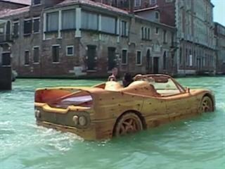 This Eccentric but Amazing Sculptor Drives Around Venice in a Floating Wooden Ferrari F50