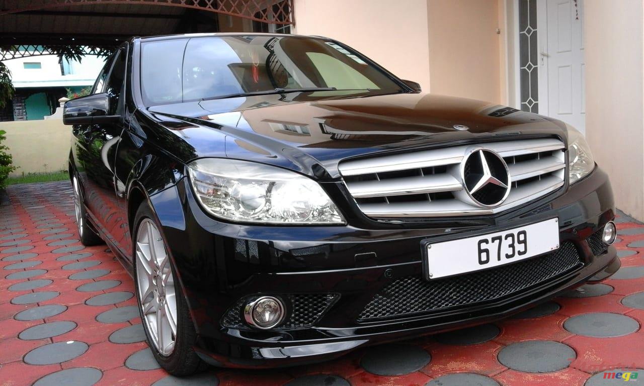 2009' Mercedes-Benz C180 AMG photo #1