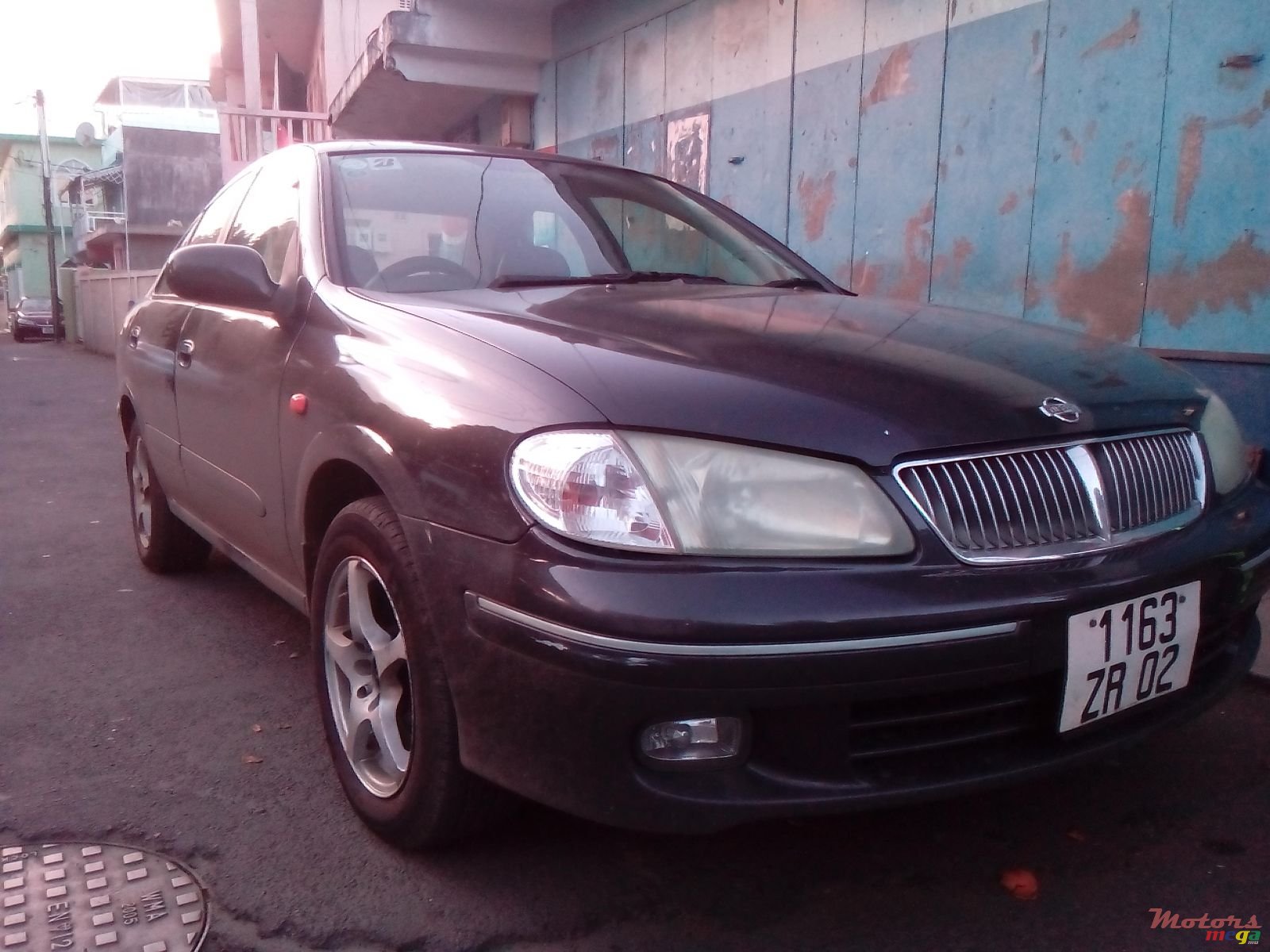 2002' Nissan Sunny photo #1