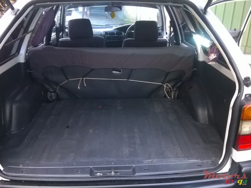 2002' Toyota Corolla spoiler..CD player etc photo #6