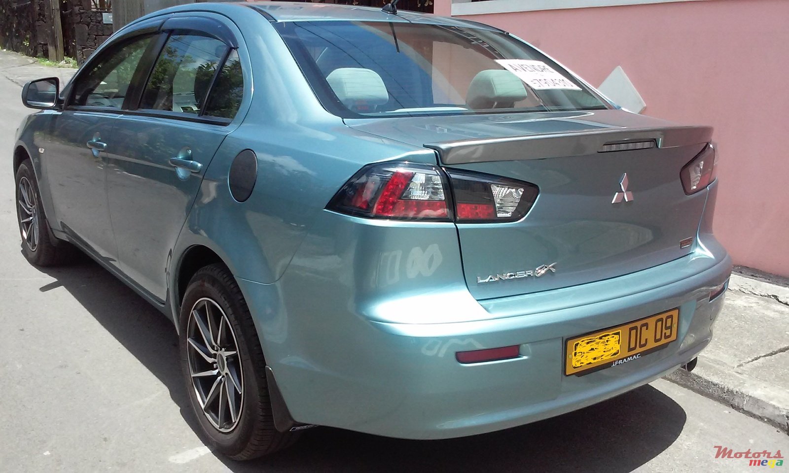 2009' Mitsubishi LANCER EX photo #2