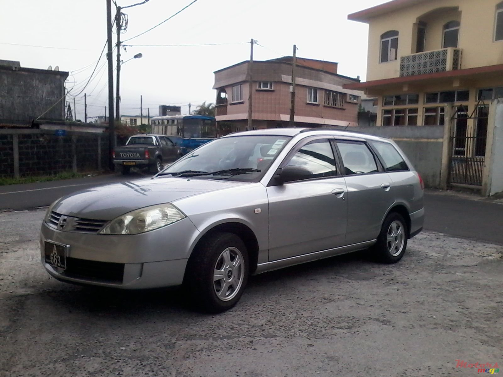 2004' Nissan Wingroad photo #1