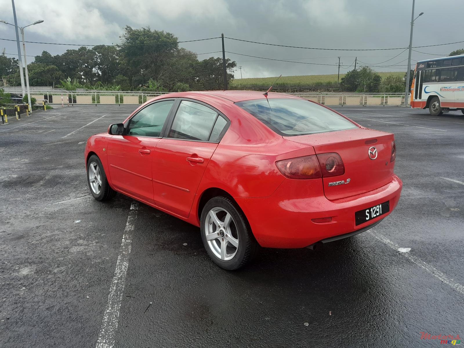 2004' Mazda 3 photo #1