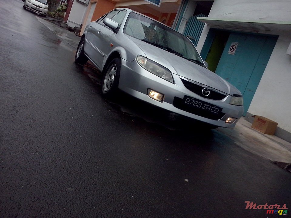 2002' Mazda 323 jant cosmic photo #1